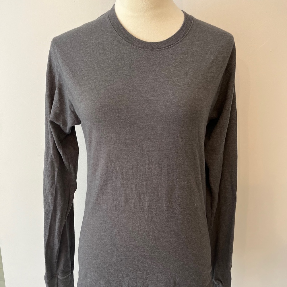 Women’s size small long sleeved gray Champions tee